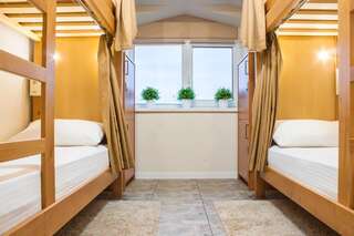 Хостелы SPA Hostel Zolote Runo, Boryspil Борисполь Кровать в общем 4-местном номере для мужчин и женщин-2